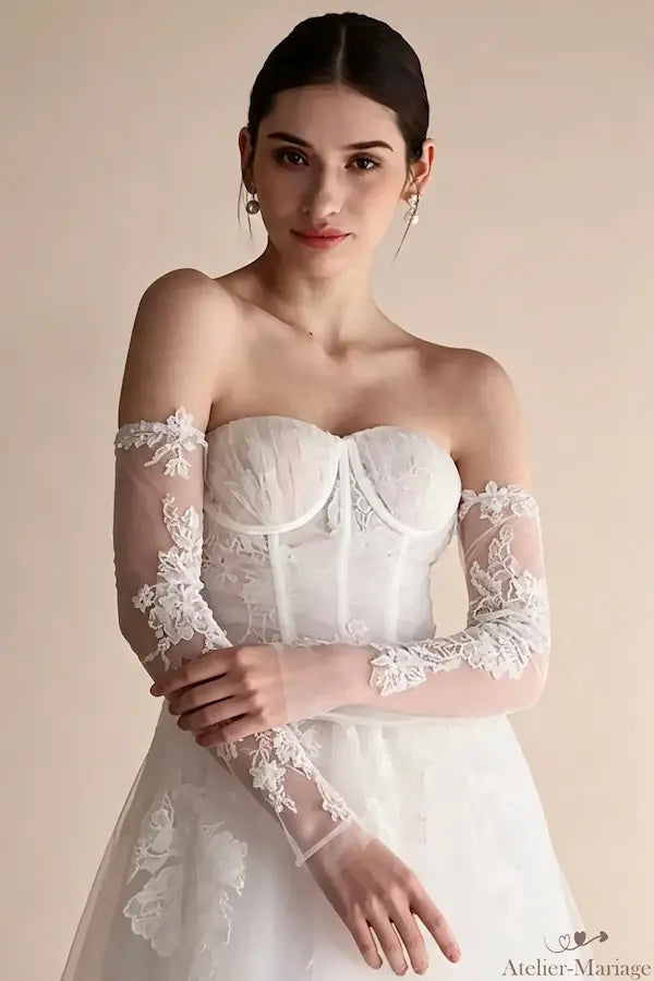 Manches longues pour robe de mariée en dentelle perlée chic et élégante