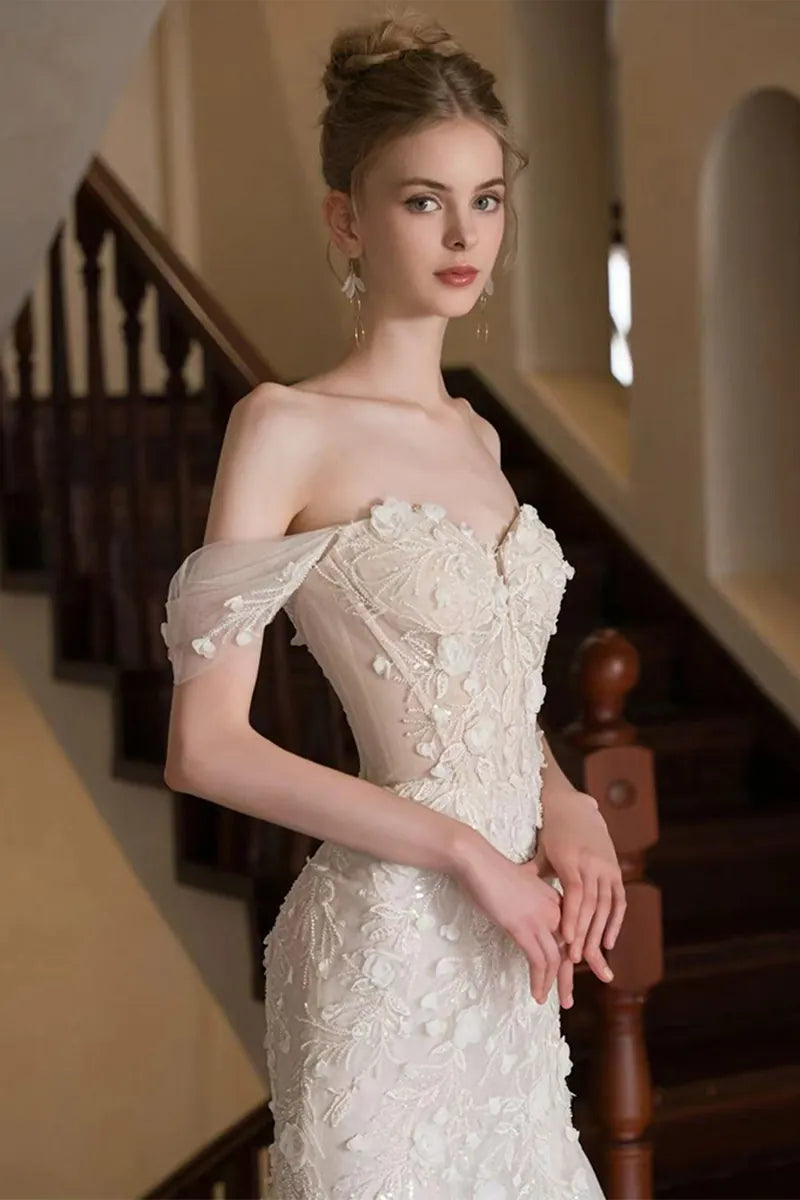 Robe de mariée bohème col bateau dentelle et tulle