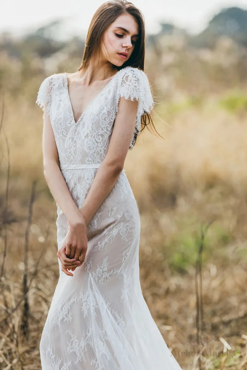 Robe de mariée bohème sur-mesure en dentelle fine, manches courtes, style champêtre pour mariage