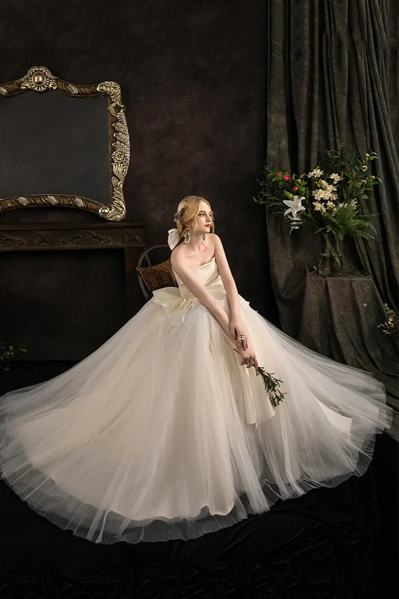 Robe de mariée princesse bustier drapé volants tulle luxe