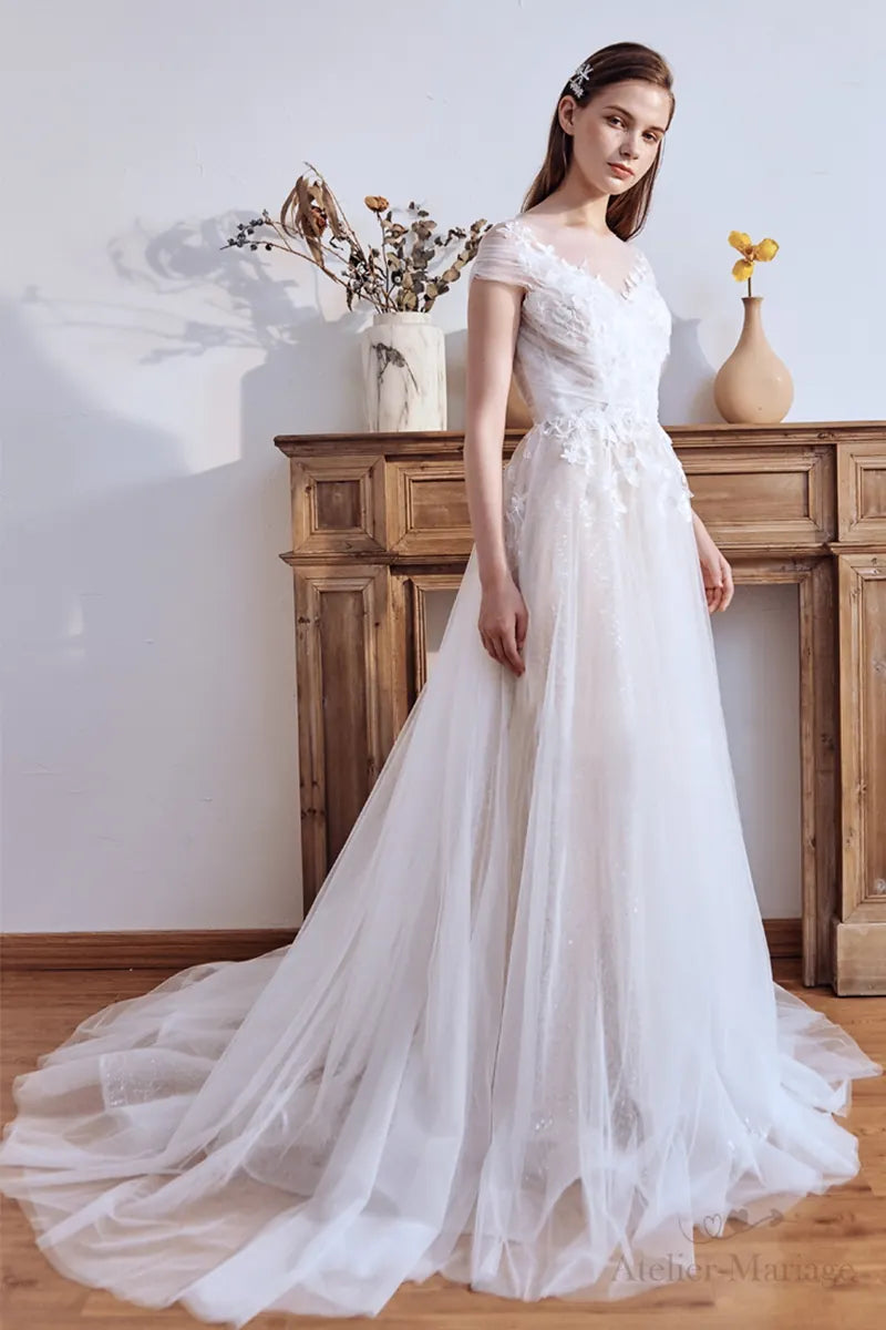 Romantic bohemian country wedding dress with boat neck lace and beaded floral motifs - garden nature wedding