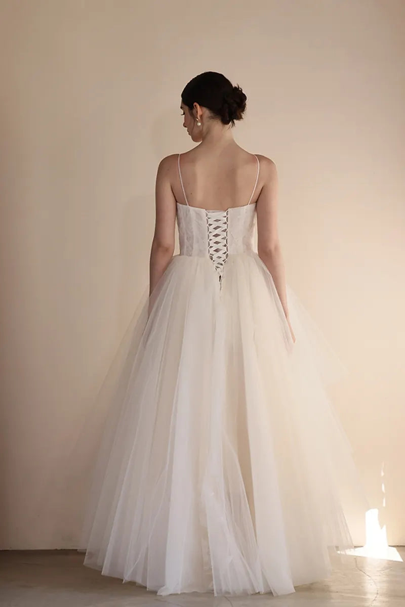 Dos de la robe de mariée avec un magnifique laçage corset ajustable.