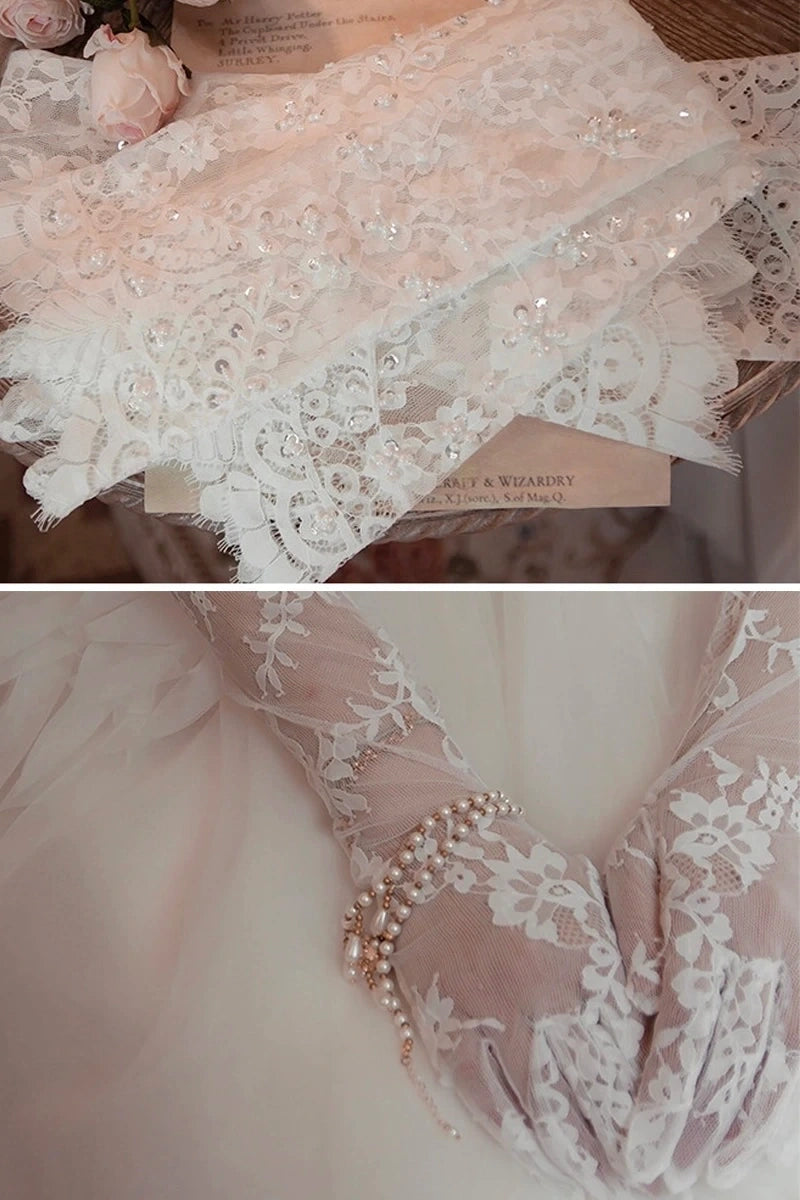 Détail des perles nacrées et sequins cousus main sur dentelle de mariée.