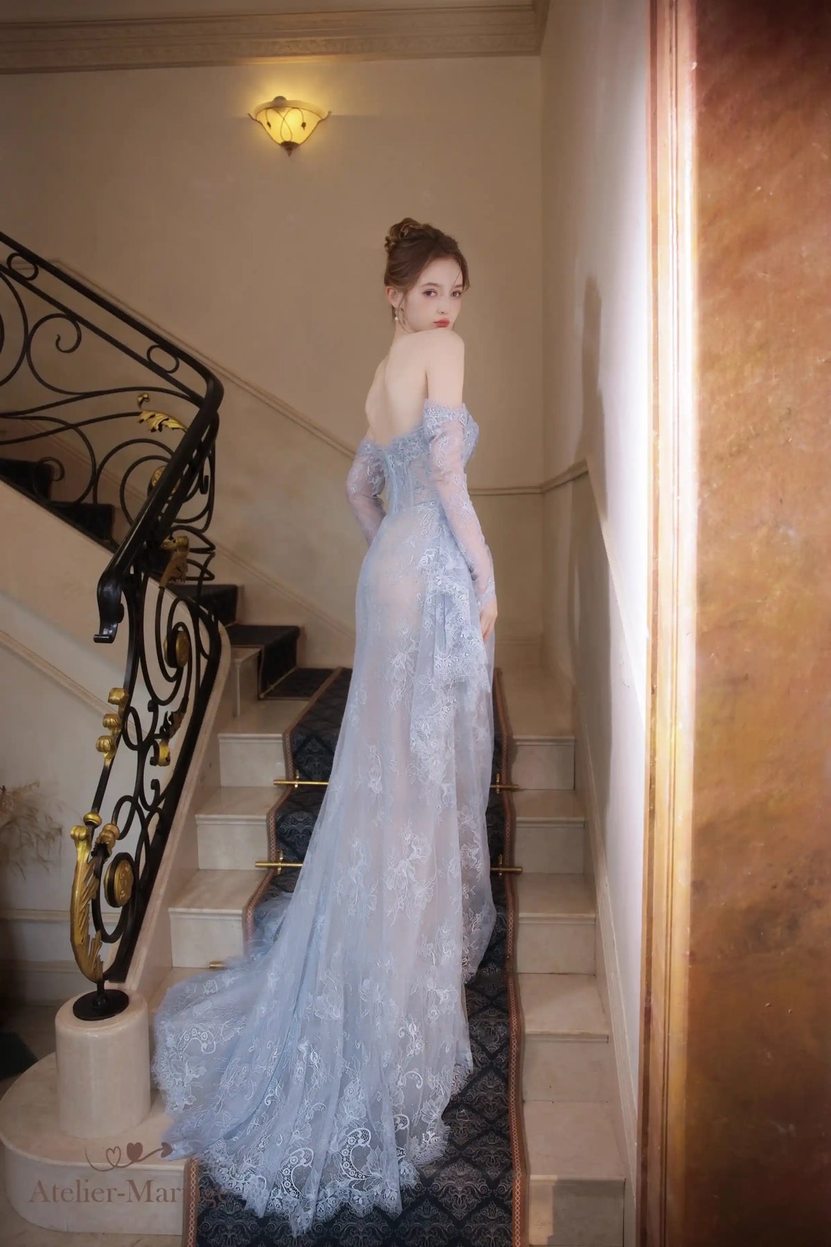 Vue de dos de la robe de mariée montrant la fermeture à lacet corset et la doublure nude.