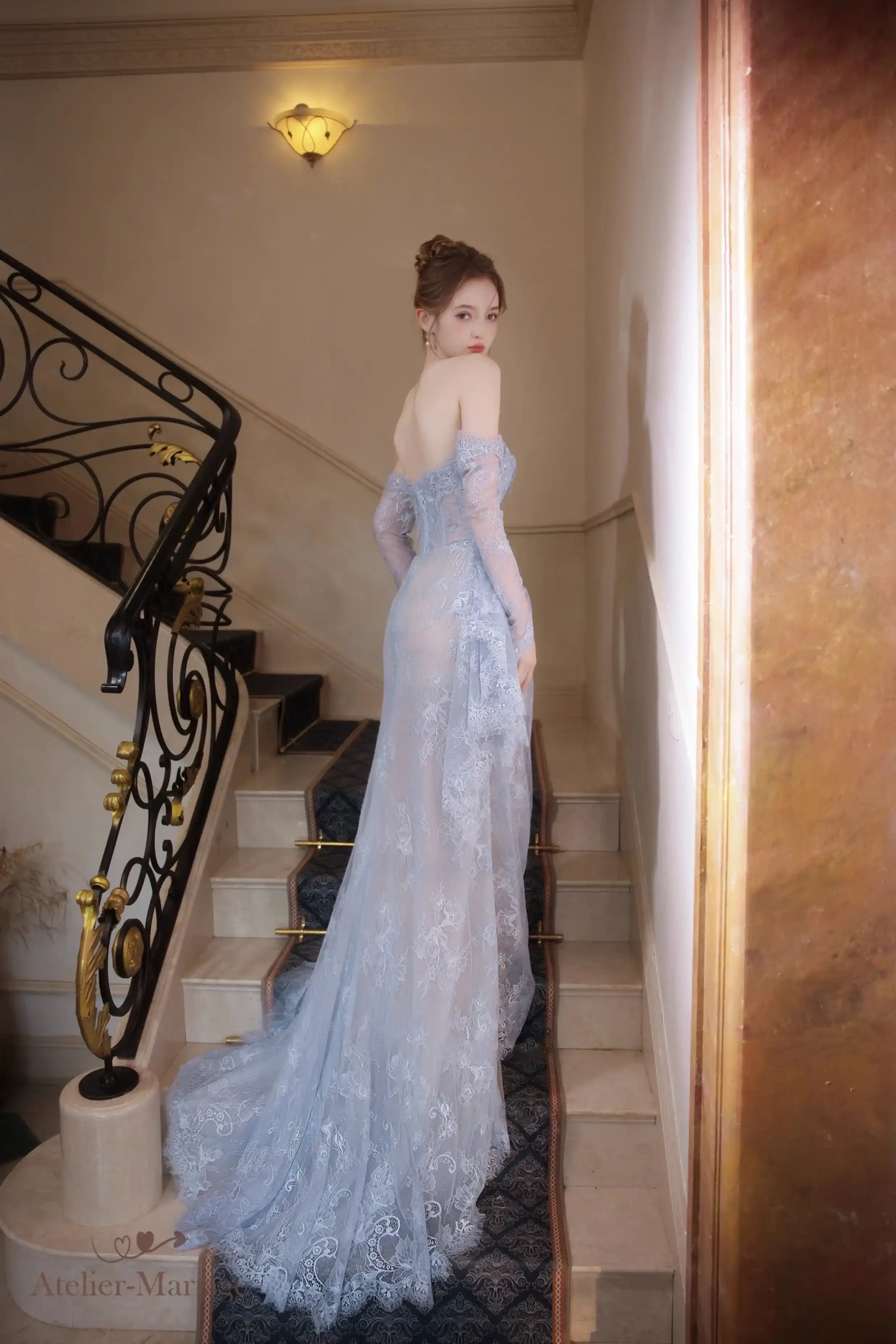 Vue de dos de la robe de mariée montrant la fermeture à lacet corset et la doublure nude.