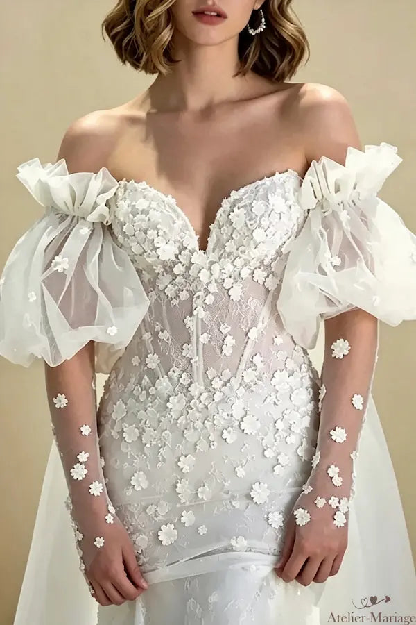 Manches bouffantes amovibles en tulle et broderies 3D apportant du volume