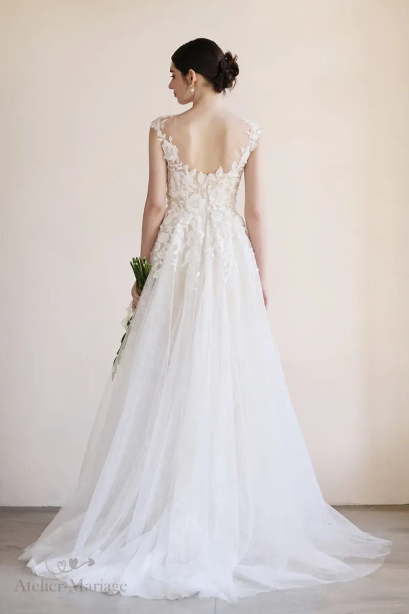 Dos de la robe de mariée bohème chic porté par la mariée