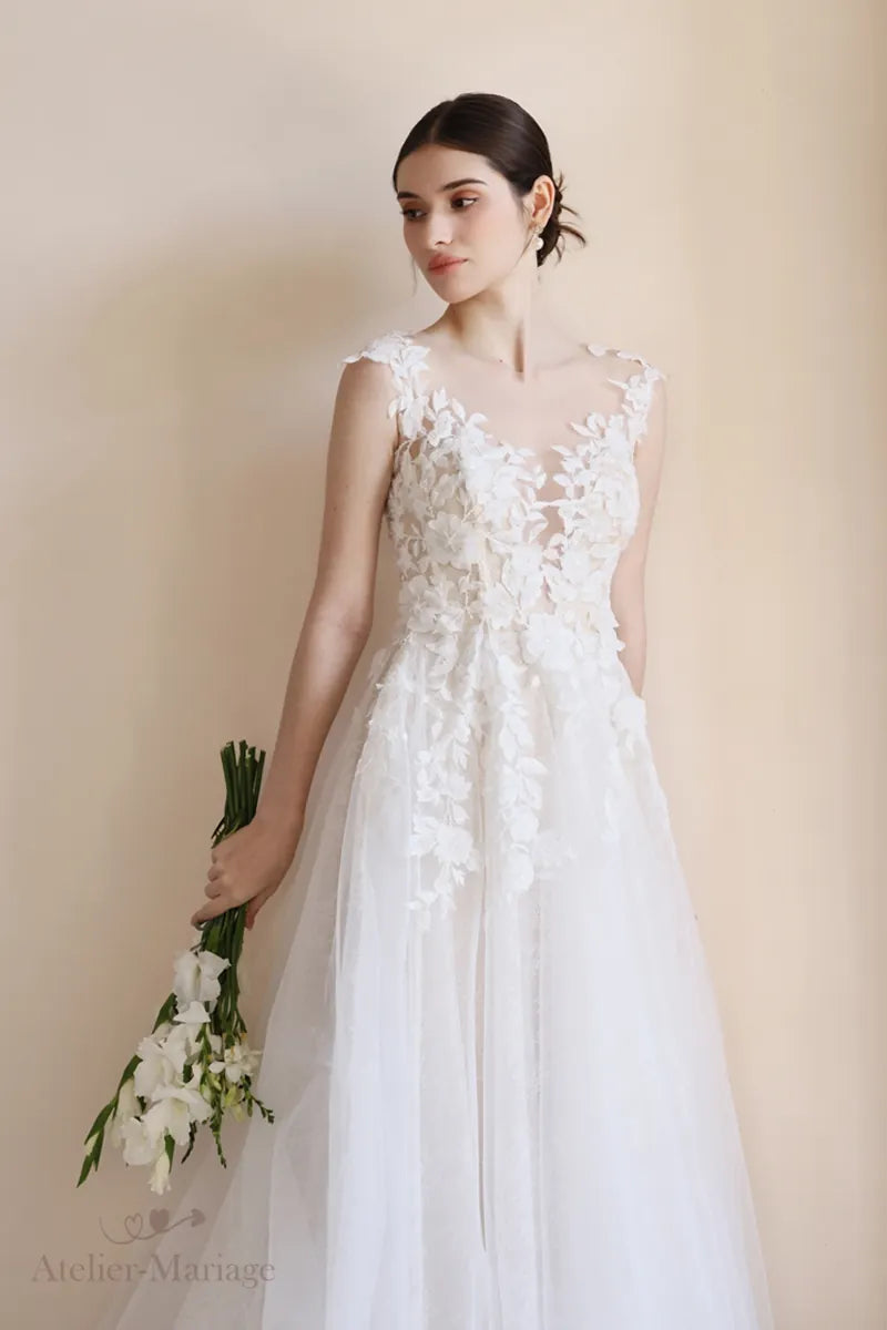 Haut de la robe de mariée bohème chic porté par la mariée