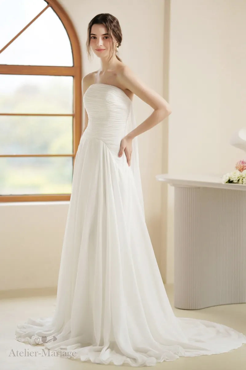 Robe de mariée bohème fluide en mousseline blanche