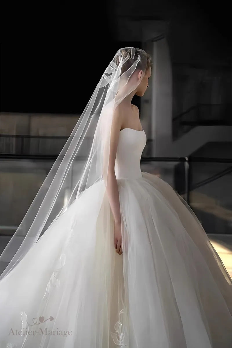 Premium romantic bohemian princess wedding dress with delicate fabric details - handcrafted quality, profile view