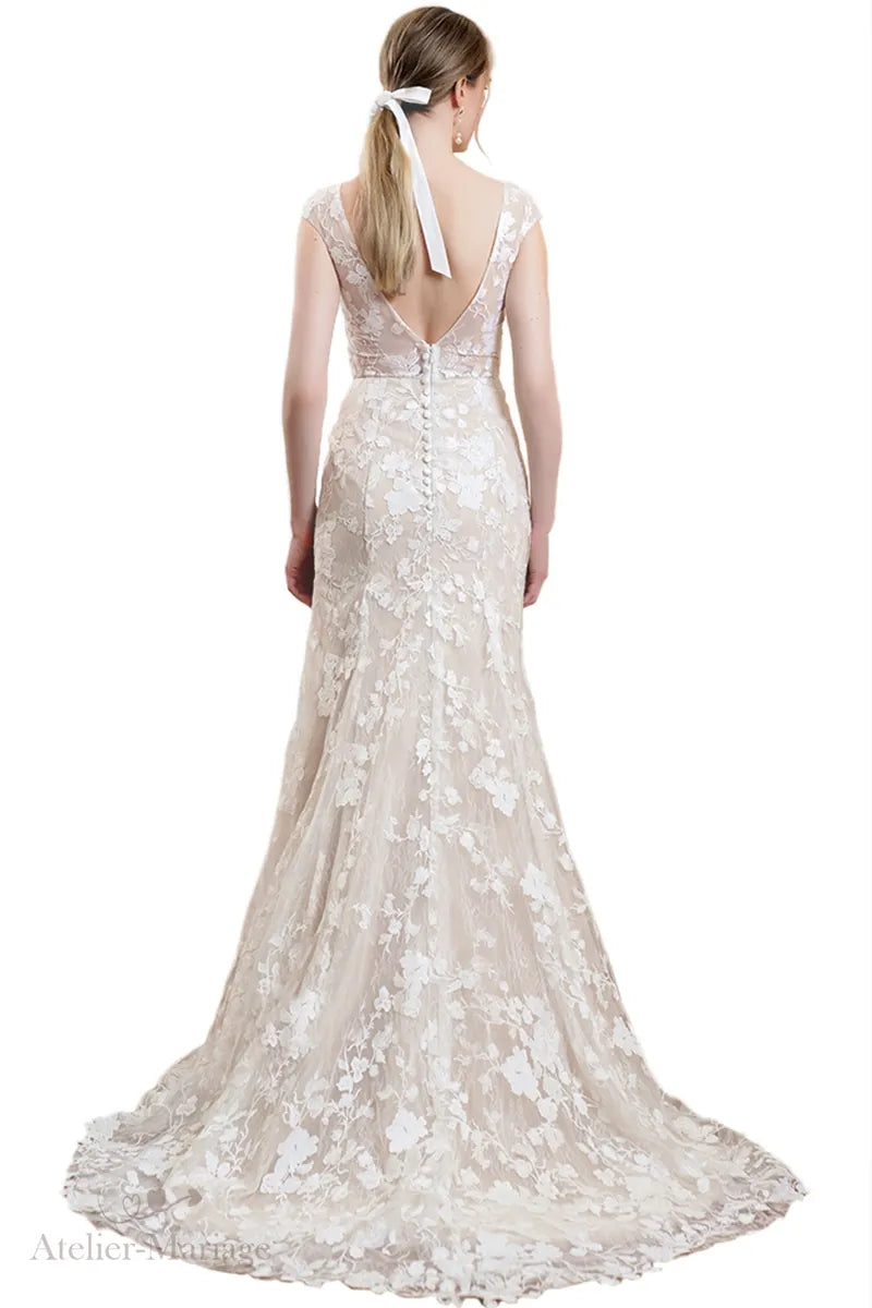 Dos de robe de mariée bohème vintage en dentelle dos nu
