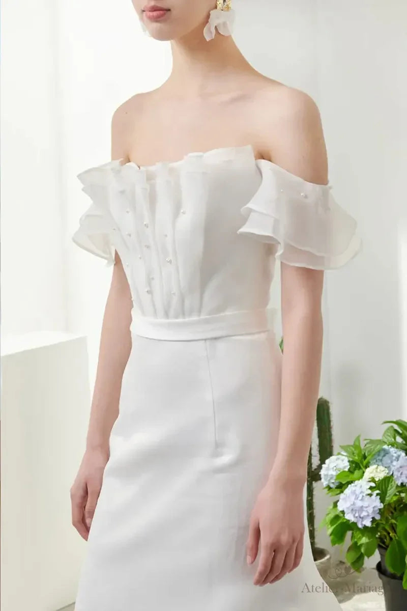 Gros plan du buste de la robe de mariée chic et simple bohème