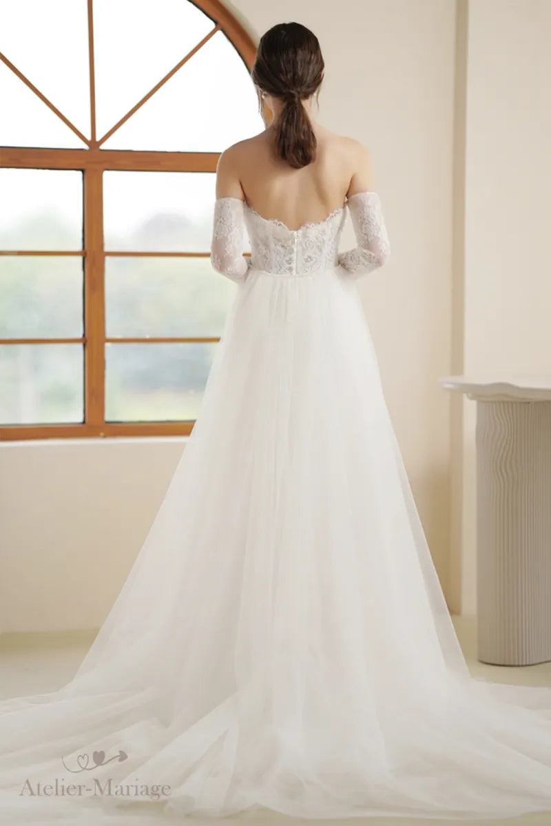 Dos et jupe de robe de mariée manche longue bohème champêtre