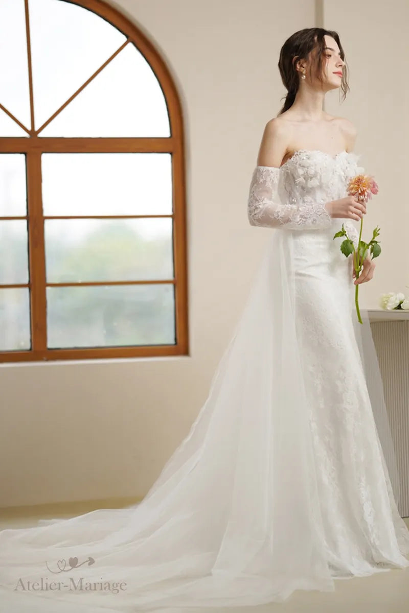 Mariée portant une robe manche longue bohème champêtre, avec allure divine