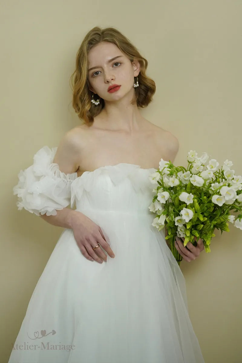 Haut de robe de mariée romantique bohème à manches bouffantes