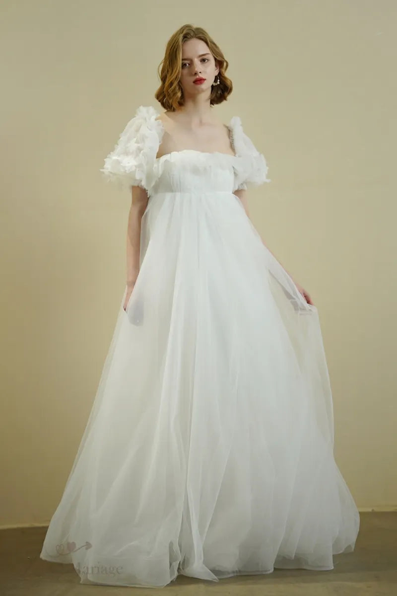 Robe de mariée romantique bohème à manches bouffantes raffinée