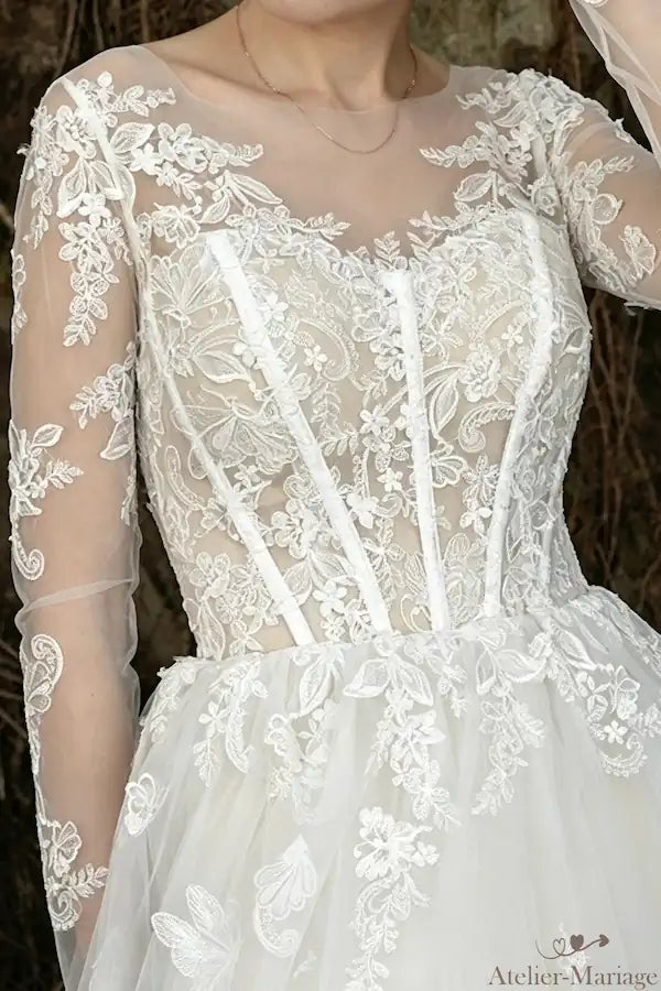 Robe de mariée romantique en tulle, manches longues et broderie 3d Atelier-Mariage