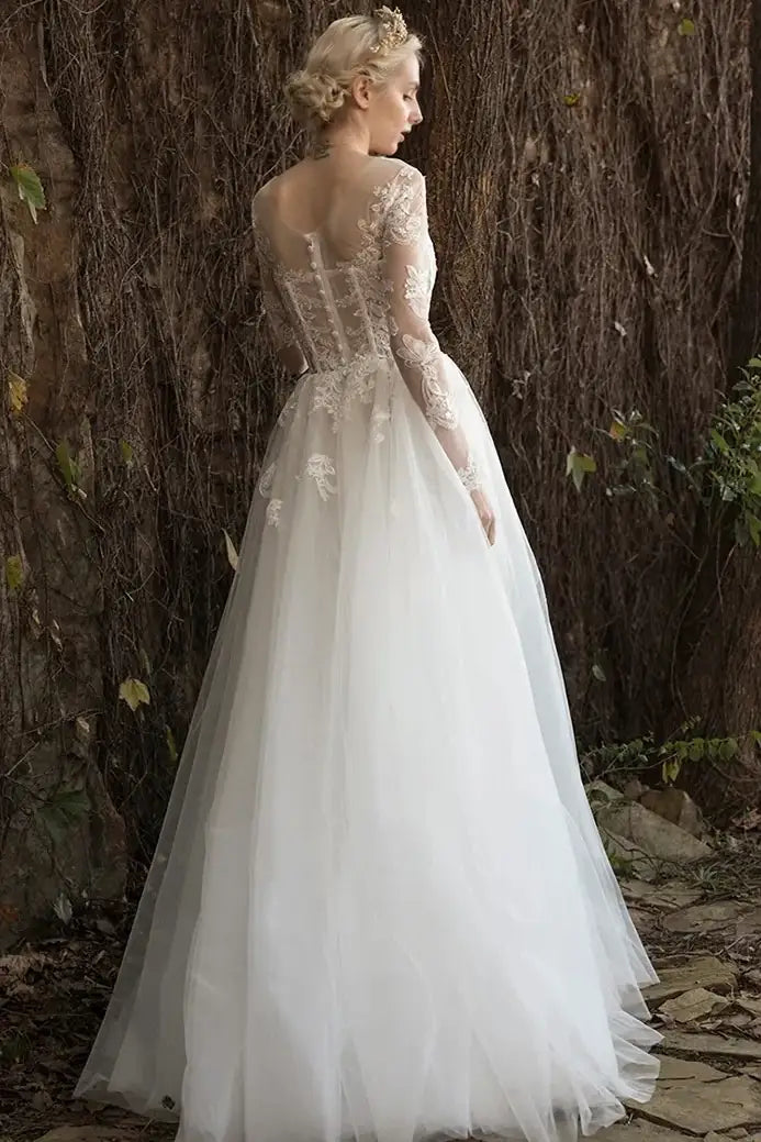 Robe mariée romantique dos tulle dentelle jupe volumineuse traîne