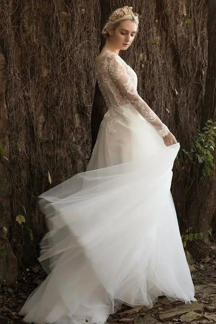 Robe mariée princesse tulle jupe volumineuse en mouvement profil élégant