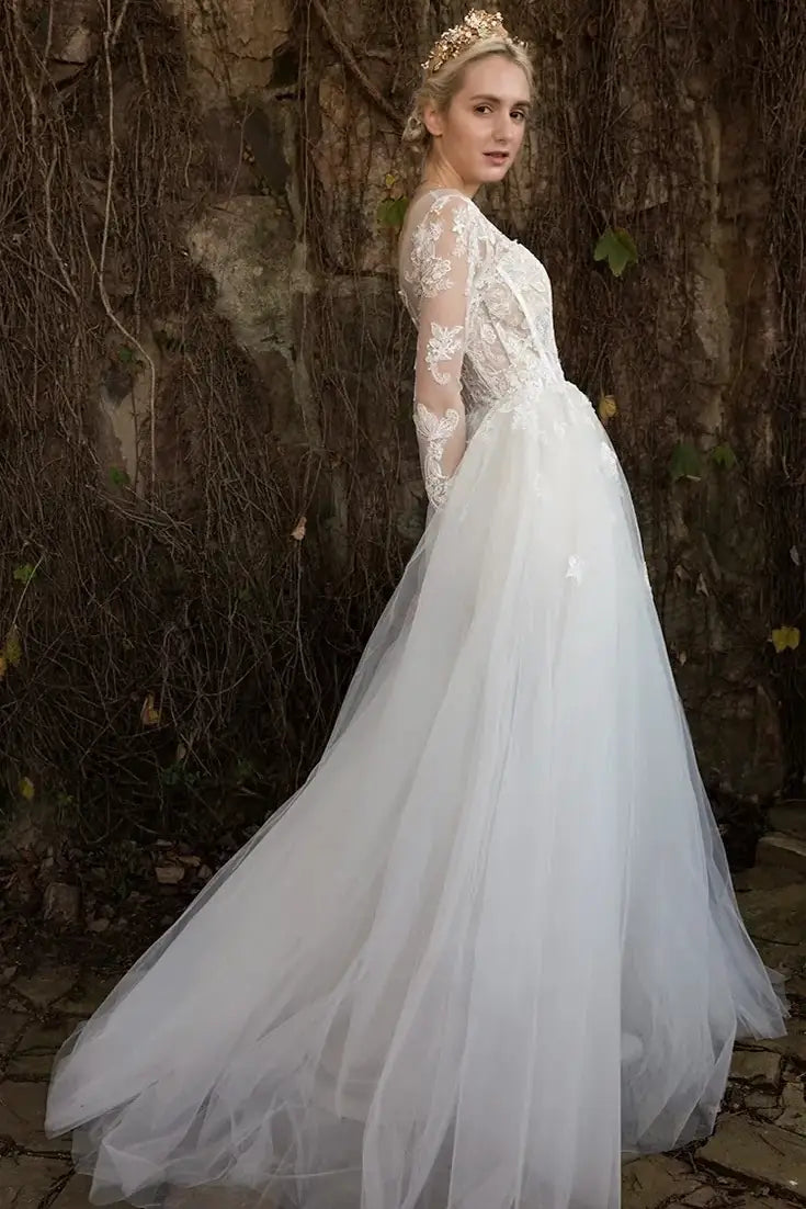 Robe de mariée romantique tulle profil jupe princesse traîne légère