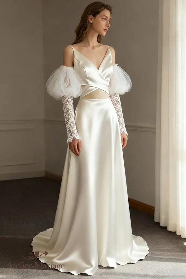 Bustier de mariée en satin avec fines bretelles, alliant élégance traditionnelle et audace contemporaine.