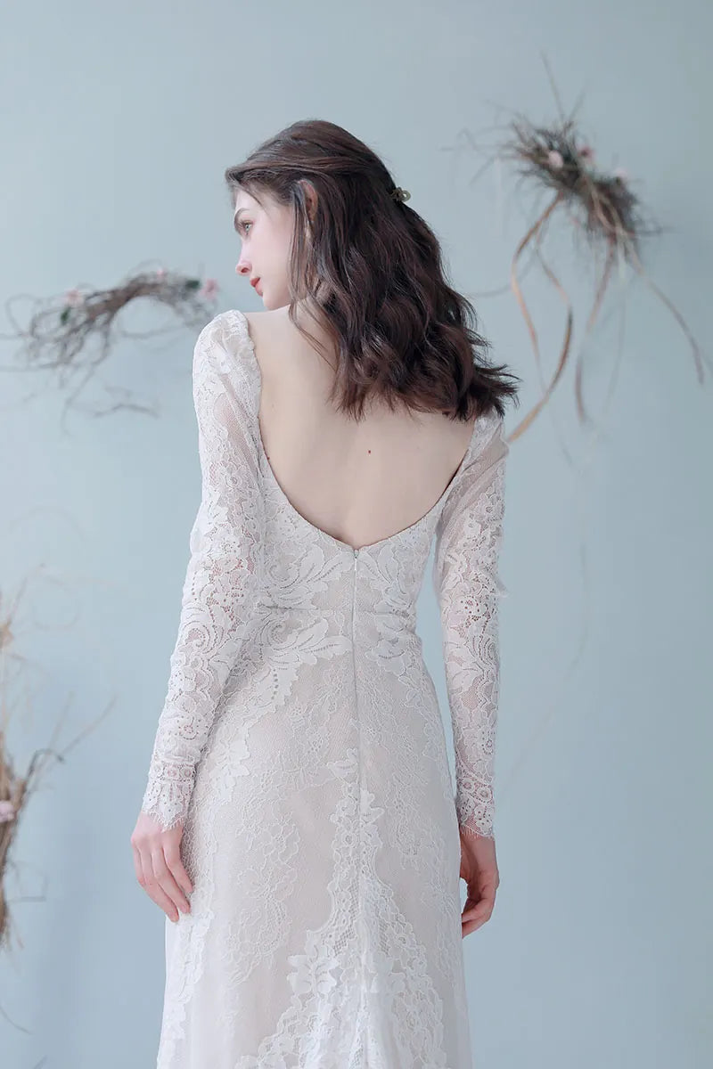 Dos dentelle robe mariée décolleté V profond fermeture zip invisible