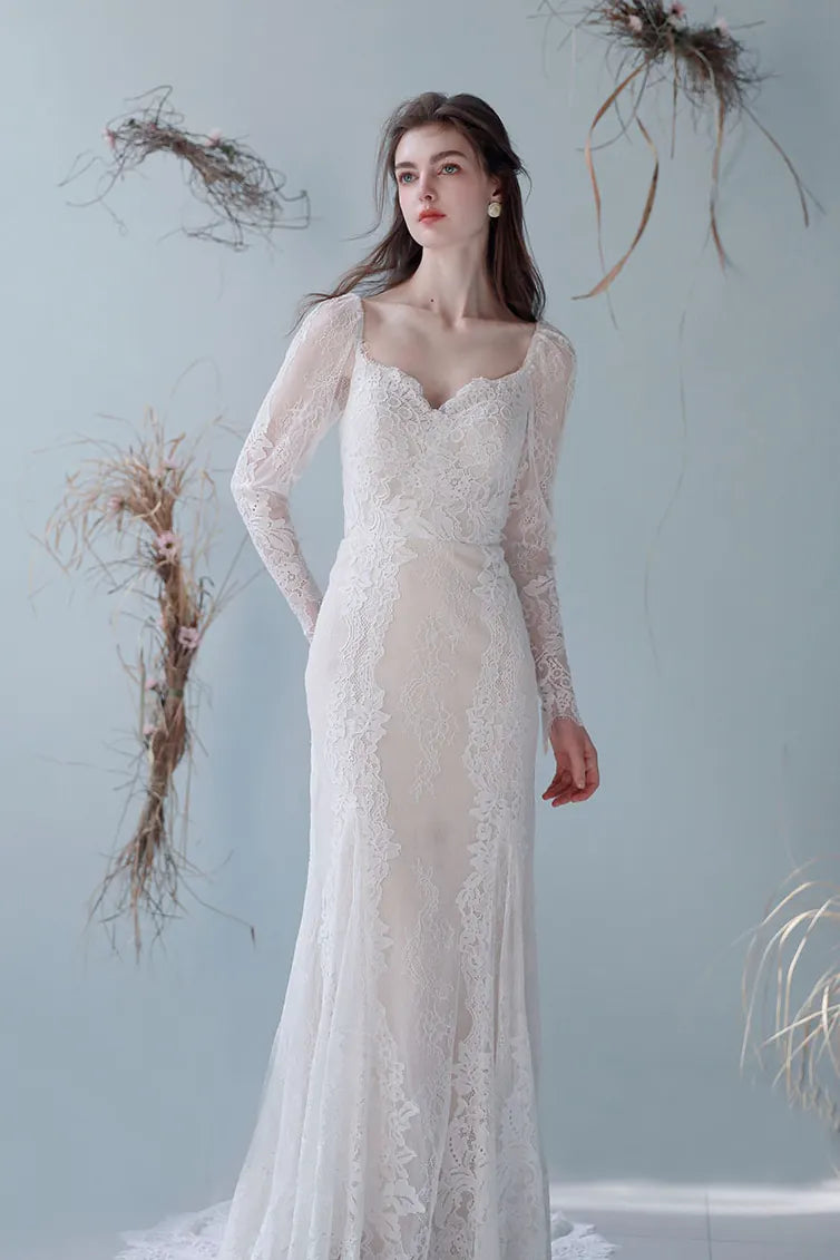 Robe de mariée sirène effet minceur dentelle doublure nude champagne