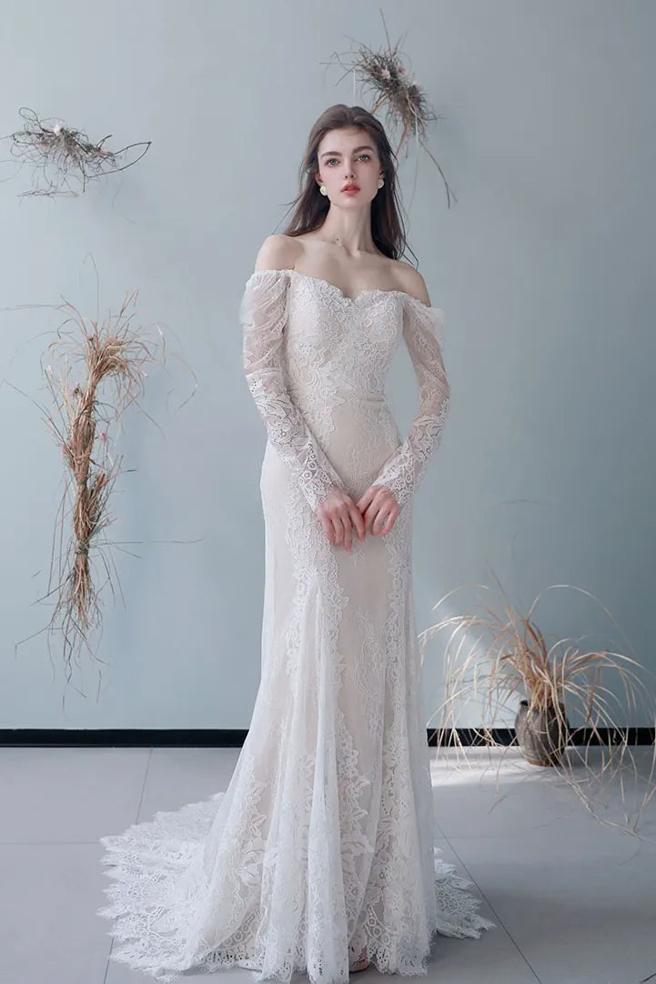 Robe mariée bohème dentelle col bardot manches longues vue complète élégante